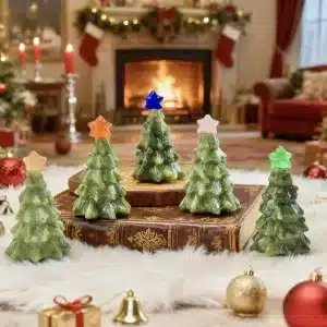 A meticulously carved Christmas tree figurine made from translucent Xiuyan Jade, featuring a smooth surface and characteristic pale green color.