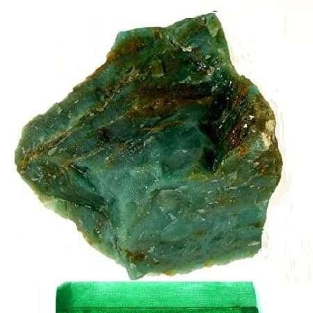 Chrysoprase Rough 2 Chrysoprase Rough, green gemstone in its natural, unpolished form with an uneven texture.