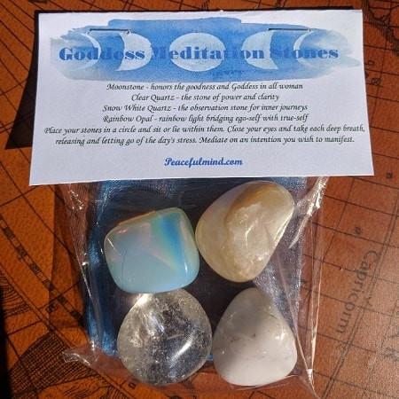 Goddess Gift Set 2 Goddess Gift Set, set of four polished stones including moonstone, clear quartz, rainbow opal, and pearl, enclosed in a clear plastic bag with informational card.
